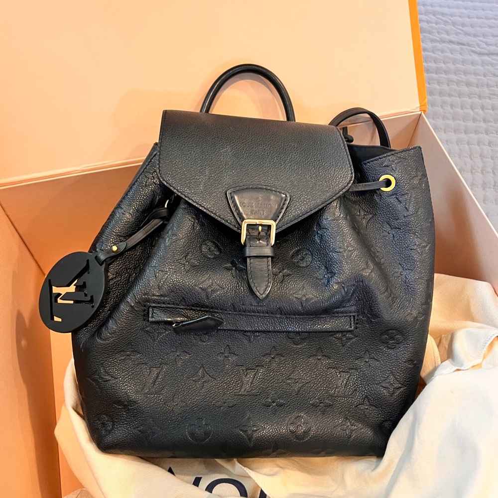 Louis Vuitton Black Backpack with Monogram Embossing and V-Shaped Clasp